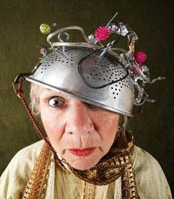 4618600-crazy-woman-wearing-a-metal-colander-for-a-helmet.jpg